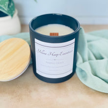 Load image into Gallery viewer, pampas grass highly scented coconut wax candle with crackling wood wick in black glass jar with wooden lid