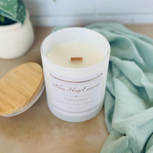 Load image into Gallery viewer, pampas grass highly scented coconut wax candle with crackling wood wick in white glass jar with wooden lid