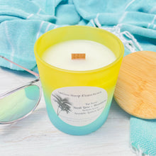 Load image into Gallery viewer, yellow and blue ombre glass jar with reusable bamboo lid highly scented coconut wax candle with crackling wood wick basil lime and mandarin top layer and seaside lemon grove bottom layer

