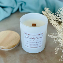 Load image into Gallery viewer, highly scented tropical ginger lime coconut wax candle with crackling wood wick in reusable white glass jar and wood lid

