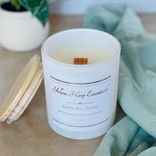 Load image into Gallery viewer, highly scented white tea and thyme coconut wax candle with crackling wood wick in reusable white glass jar and wood lid
