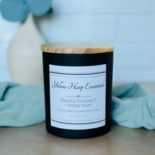 Load image into Gallery viewer, toasted coconut and stone fruit highly scented coconut wax candle in reusable black jar with wood lid and crackling wooden wick