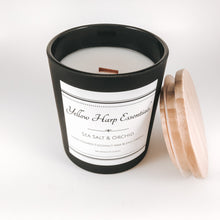Load image into Gallery viewer, sea salt and orchid scented strong fragrance floral coconut wax crackling wood wick matte black jar wood lid reusable