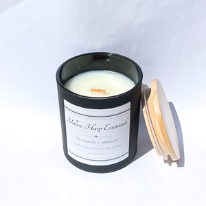 cashmere vanilla warm sexy sweet highly scented coconut wax candle with crackling wood wicks black jar reusable wood lid