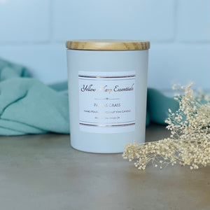 pampas grass highly scented coconut wax candle with crackling wood wick in white glass jar with wooden lid