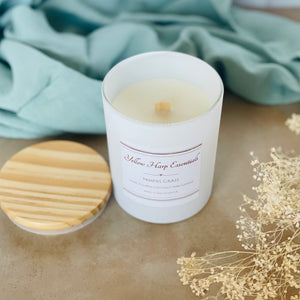 pampas grass highly scented coconut wax candle with crackling wood wick in white glass jar with wooden lid