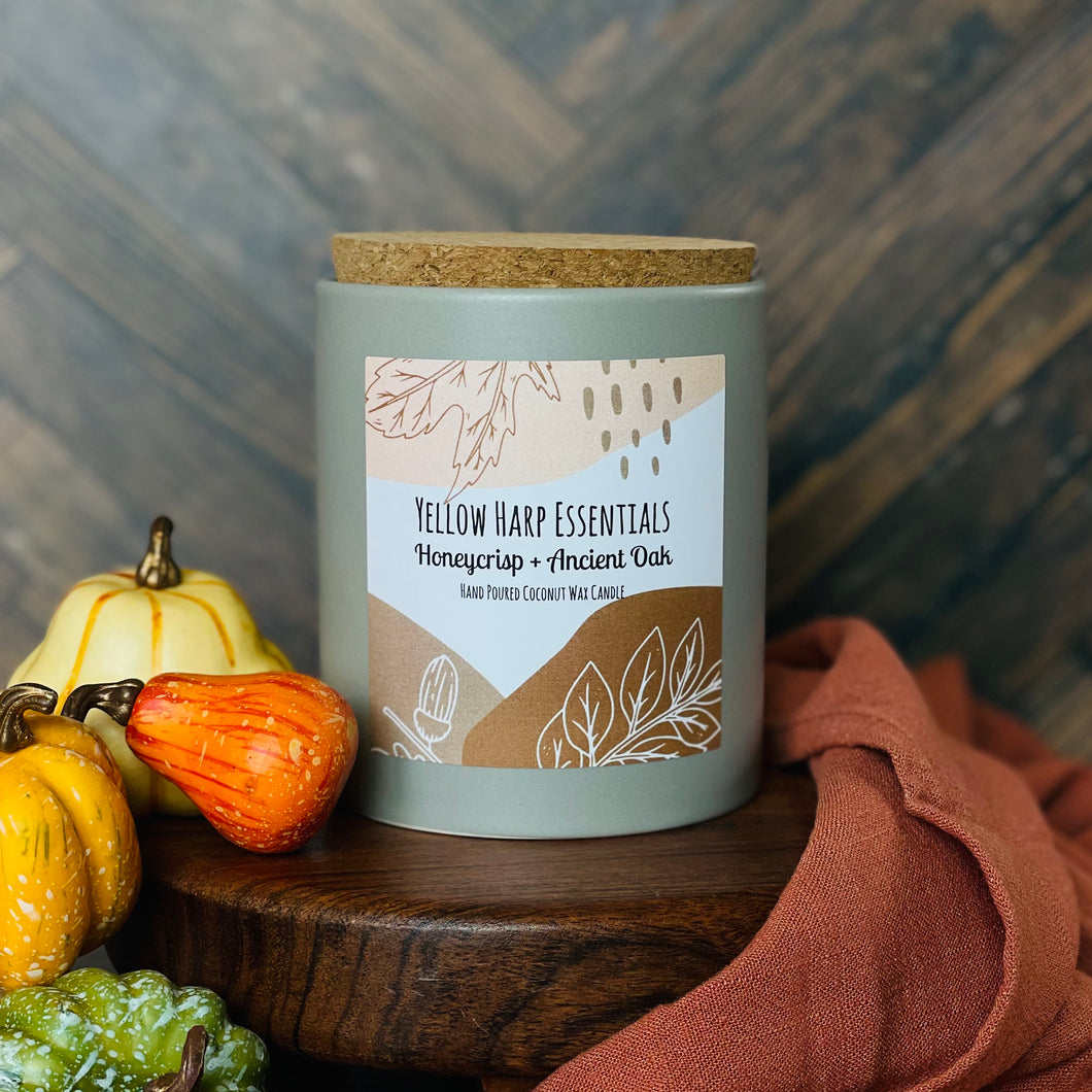 12 ounce hand poured coconut wax candle grey ceramic jar cork lid highly scented honeycrisp and ancient oak