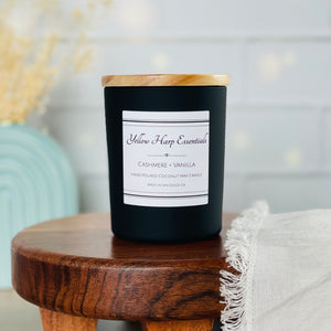 highly scented hand poured coconut wax candle black glass jar wood lid reusable cashmere vanilla wooden wick