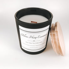 Load image into Gallery viewer, sea salt and orchid scented strong fragrance floral coconut wax crackling wood wick matte black jar wood lid reusable 
