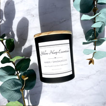 Load image into Gallery viewer, amber sandalwood scented coconut wax wooden wick candle warm earthy ozone amber cedar rich soft scented black jar wooden lid
