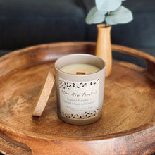 Load image into Gallery viewer, Hand poured coconut wax candle with natural crackling wood wick highly scented long lasting toasted pumpkin and spiced hazelnut cream fragrance taupe colored glass jar cork lid reusable sustainable
