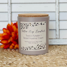 Load image into Gallery viewer, Hand poured coconut wax candle with natural crackling wood wick highly scented long lasting toasted pumpkin and spiced hazelnut cream fragrance taupe colored glass jar cork lid reusable sustainable 
