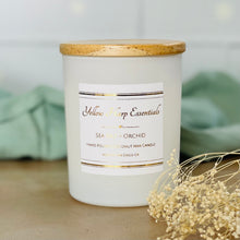 Load image into Gallery viewer, 5 ounce White matte reusable jar with wood lid sea salt orchid scented candle coconut wax wooden wick
