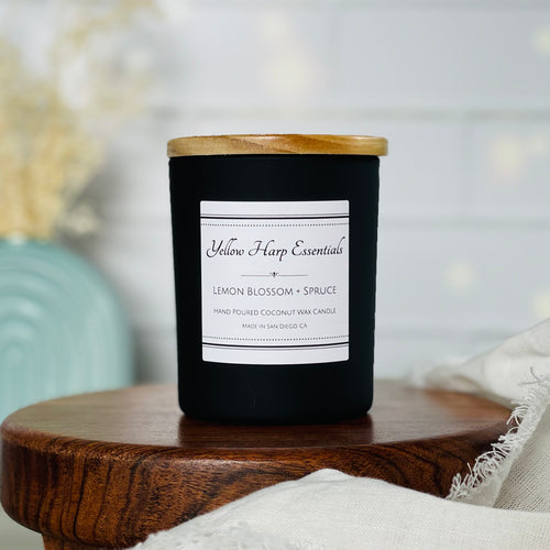 5 ounce black matte reusable jar with wood lid lemon blossom spruce scented candle coconut wax wooden wick