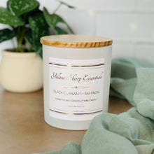 Load image into Gallery viewer, Black Currant + Saffron scented coconut wax candle with crackling wood wick reusable matte white glass jar wood lid
