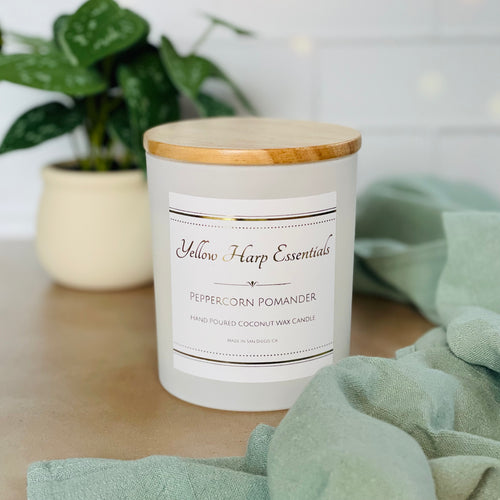 Peppercorn Pomander scented coconut wax candle with crackling wood wick reusable matte white glass jar wood lid