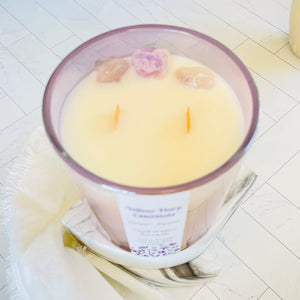 large 14 ounce coconut wax candle with double crackling wood wicks in a glass reusable purple jar raw amethyst stones highly scented white rose and neroli in linen bag