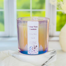 Load image into Gallery viewer, large 14 ounce coconut wax candle with double crackling wood wicks in a glass reusable purple jar raw amethyst stones highly scented white rose and neroli in linen bag
