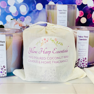 large 14 ounce coconut wax candle with double crackling wood wicks in a glass reusable purple jar raw amethyst stones highly scented white rose and neroli in linen bag