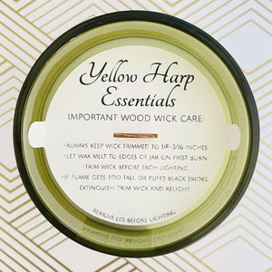 hand poured coconut wax candle crackling wood wick green jar dust cover reusable sustainable cardamom cream macaron scent